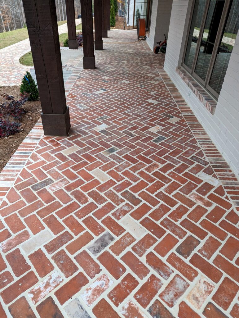 Thin brick on a front porch and walkway. Old Chicago brick, Copper Creek Brick, and Independence Hall brick blend.